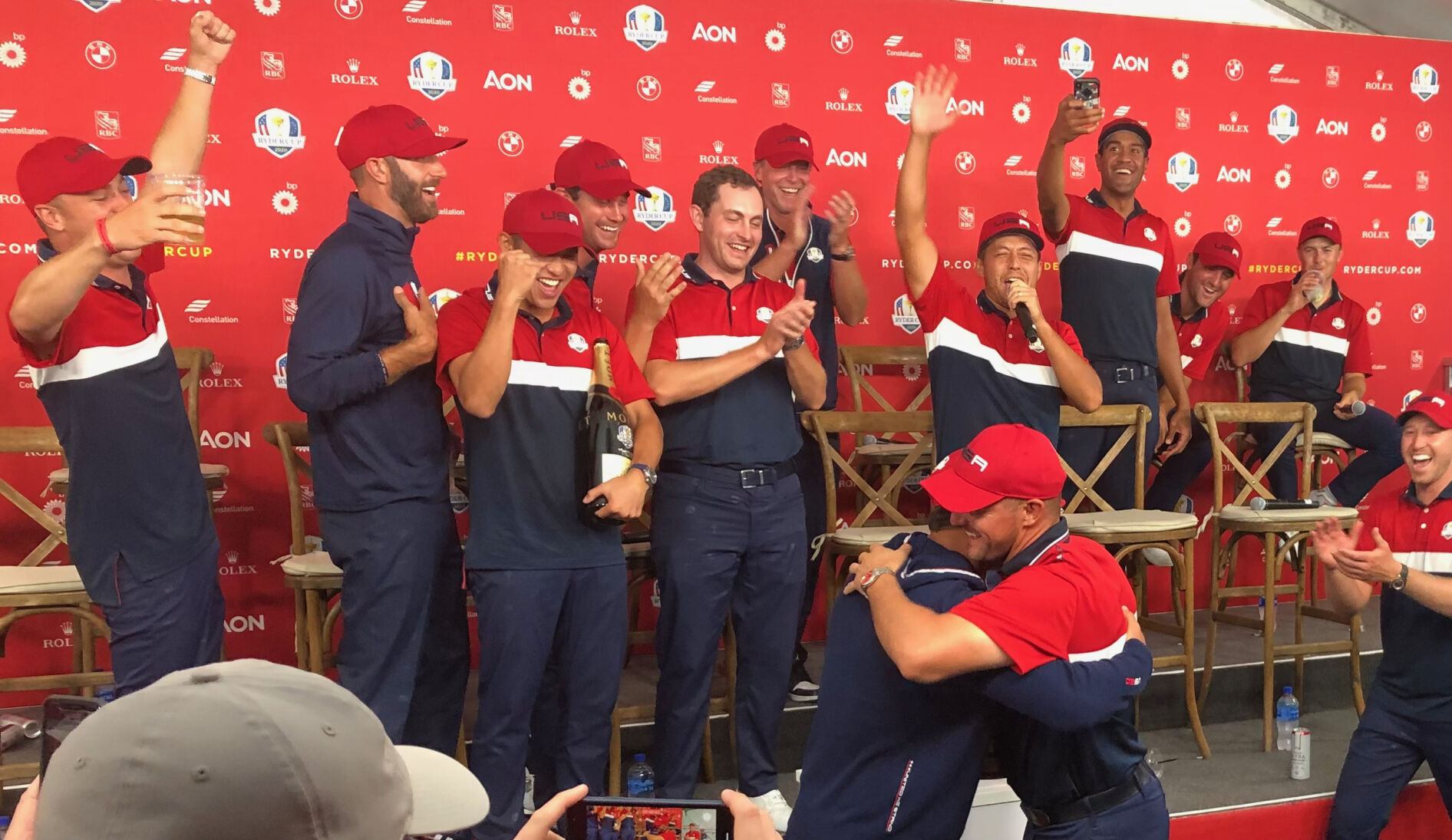 Bryson DeChambeau, Brooks Koepka hug